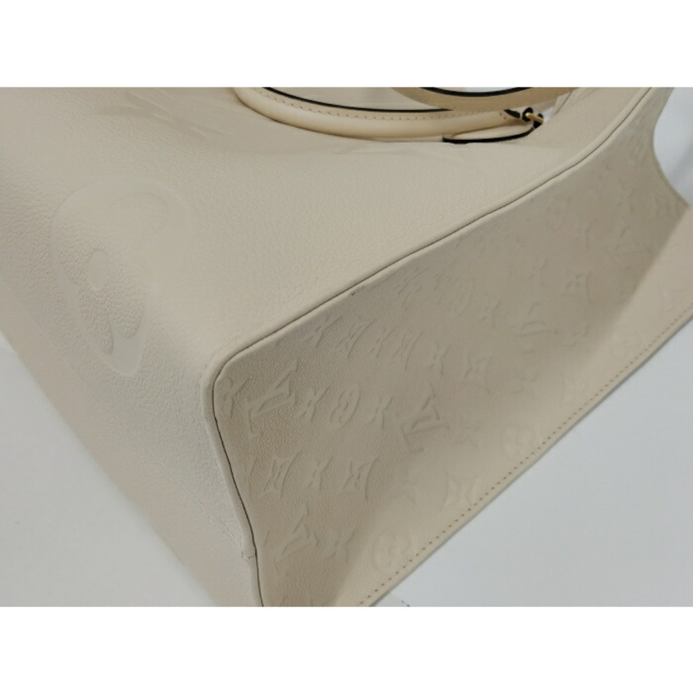 Louis Vuitton Onthego Empreinte Shoulder Bag Beige - Picture 5 of 10